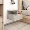 Kelluvat yöpöydät 2 kpl betoninharmaa 40x31x27 cm lastulevy